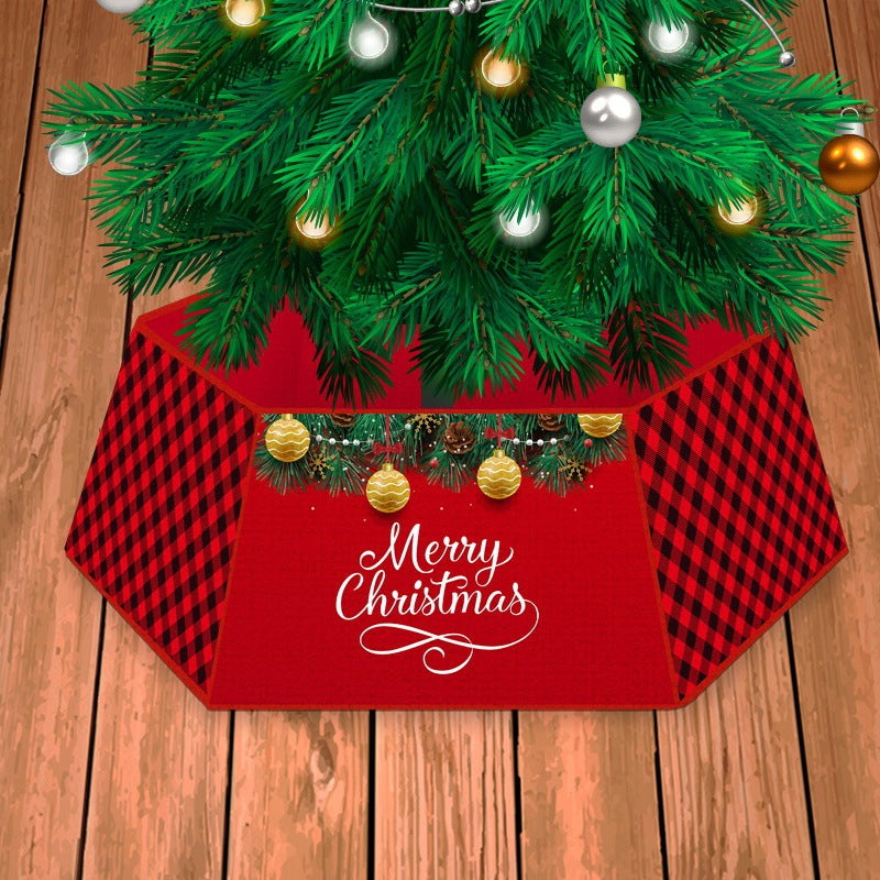 Christmas tree skirt in red with Merry Christmas design under a festive green tree.